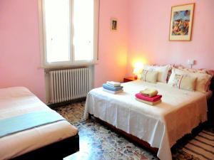 Postel nebo postele na pokoji v ubytování Apartment in Gatteo near Adriatic Beach