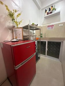 Eldhús eða eldhúskrókur á Tacloban EVMC Gdex Transient House