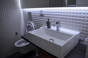 Vannituba majutusasutuses Apartments Good Night