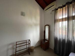 Postel nebo postele na pokoji v ubytování BlissFam Villa & Hostel
