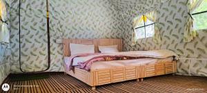 Ένα ή περισσότερα κρεβάτια σε δωμάτιο στο cliff camps barot