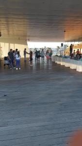 a group of people standing under a building at Lyesblb in Valencia