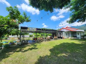 En trädgård utanför 屏東幸福莊園庭園民宿