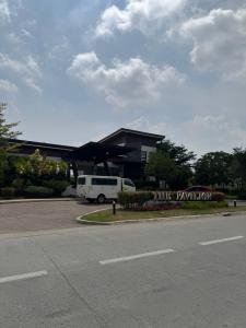 a white van parked in front of a building at Casa Mira in Dasmariñas
