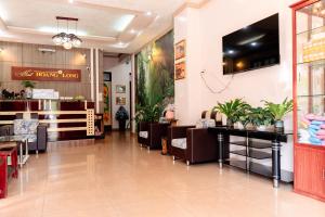 TV a/nebo společenská místnost v ubytování Hoang Long Hotel Da Lat City