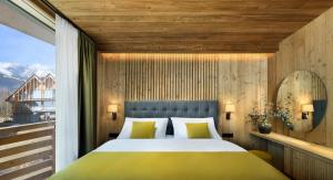 Katil atau katil-katil dalam bilik di Hotel ELEMENTS Tatranska Lomnica