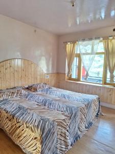 Letto o letti in una camera di The Mystic Heaven
