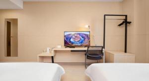 Katil atau katil-katil dalam bilik di JinJiang Inn Datong Pingchengqiao