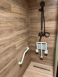 a bathroom with a shower with a white shower at Arda Oasis Hotel in Khiva +20 photos