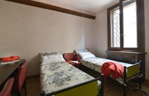 A bed or beds in a room at UR-NEST Guerrazzi
