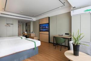 GreenTree Inn Express Laizhou Bus Station Wenhua Xi Streetにあるベッド +118枚の写真