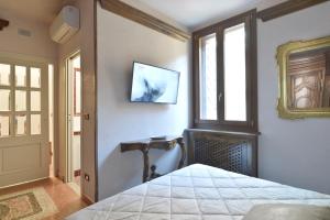 A television and/or entertainment centre at UR-NEST Guerrazzi
