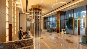 Foto dalla galleria di Guangzhou Baiyun Airport Orange Crystal Hotel a Huadu