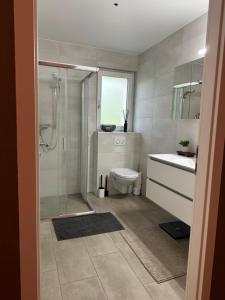Koupelna v ubytování Grande chambre avec salle de bain privé