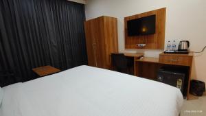 AI 360 Degree Hotel客房内的一张或多张床位