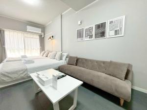 Zona de estar de Neighbor's Hotel 西十日市