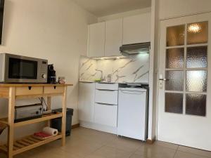 Kuchyň nebo kuchyňský kout v ubytování Apartment Superior Santa Cruz