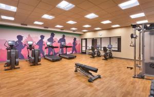 a gym with several treadmills and machines in a room at Hyatt Place Park City in Park City +106 photos