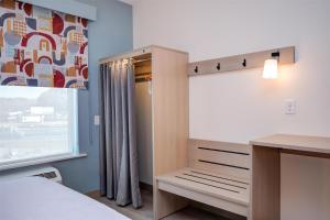 Home2 Suites By Hilton Smithfield Selma客房内的一张或多张床位