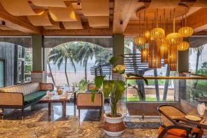 Area soggiorno di White Wharf Beach Resort Morjim Goa