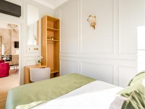 Posteľ alebo postele v izbe v ubytovaní Merveil - Luxury Suite - Louvre - Opera II