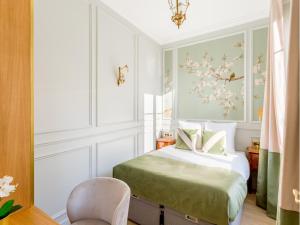 Posteľ alebo postele v izbe v ubytovaní Merveil - Luxury Suite - Louvre - Opera II