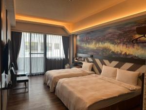 En eller flere senger på et rom på Weifeng Boutique Business Hotel - Zhanqian Branch
