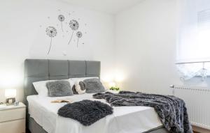 Ένα ή περισσότερα κρεβάτια σε δωμάτιο στο Villa Dom&San by Villas Guide +16 φωτογραφίες