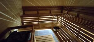 a view from the top of a small room with wooden walls at Penzion Zázrifka in Zázrivá