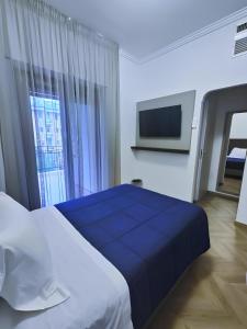 Postel nebo postele na pokoji v ubytování Hotel Casa Tra Noi