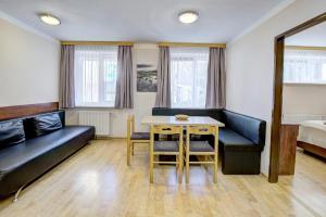 Posezení v ubytování Appartement Alpensee