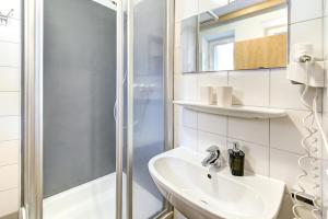 Koupelna v ubytování Appartement Alpensee