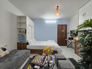 Ένα ή περισσότερα κρεβάτια σε δωμάτιο στο The Chilling'N Homestay Ha Noi 89 +16 φωτογραφίες