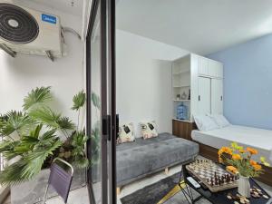 Ένα ή περισσότερα κρεβάτια σε δωμάτιο στο The Chilling'N Homestay Ha Noi 89