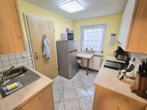 Kuchyň nebo kuchyňský kout v ubytování Ferienwohnung "Corinna" Objekt-ID 12140-8