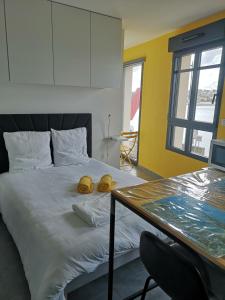 Postel nebo postele na pokoji v ubytování Appartement Devant la Mer