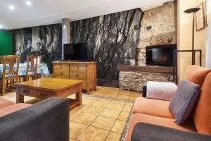 TV a/nebo společenská místnost v ubytování Aguas Frías 3