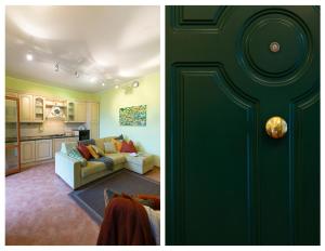 a green door and a living room with a couch at La Casa di Marco, holidays, sea and nature in Montiano +31 photos
