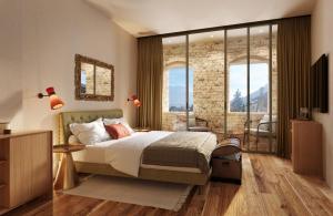 Postel nebo postele na pokoji v ubytování Langenmantel Historic Suites