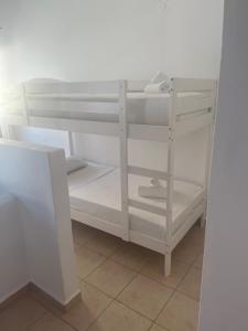 Postel nebo postele na pokoji v ubytování White island rooms
