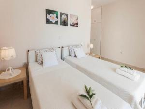 Ένα ή περισσότερα κρεβάτια σε δωμάτιο στο Villa Daphne +38 φωτογραφίες