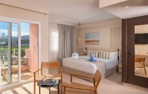 เตียงในห้องที่ AQUA Hotel The Breeze & Spa - All Inclusive - Adults Only - 4Sup +152 ภาพ