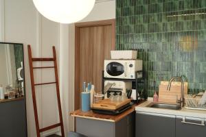 Η κουζίνα ή μικρή κουζίνα στο Atelier Vert