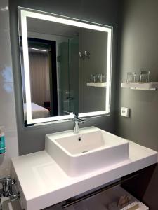 Koupelna v ubytování Novotel Suites Clermont Ferrand Polydome + 37 fotografií