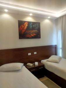 Voodi või voodid majutusasutuse Salma Hotel Cairo toas