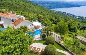 an aerial view of a house with a swimming pool at Vila Iris - Opatija by Villas Guide in Breza