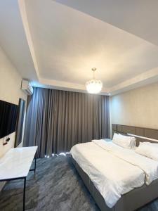 Ένα ή περισσότερα κρεβάτια σε δωμάτιο στο Cozy 2 bed Room - in East legon