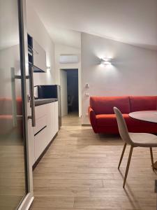 Η κουζίνα ή μικρή κουζίνα στο Galaxy Rooms Tropea