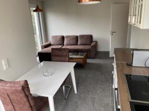 Χώρος καθιστικού στο Helle und gemütliche Neubauwohnung in Lüstringen +8 φωτογραφίες