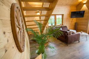 TV a/nebo společenská místnost v ubytování Chalet Hüttenzauber